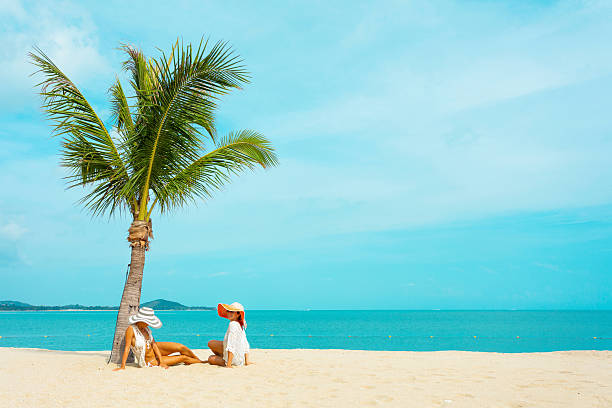 istock woman on a tropical beach 539471154