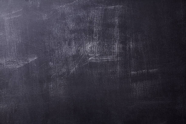 istock Old blackboard in close-up with scratches 539471198