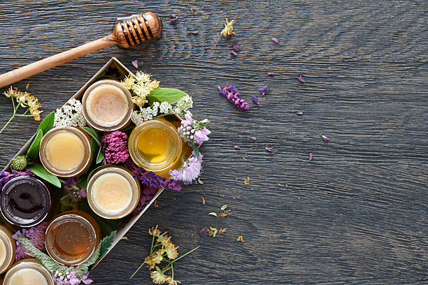istock Different kinds of honey in a box 539473036