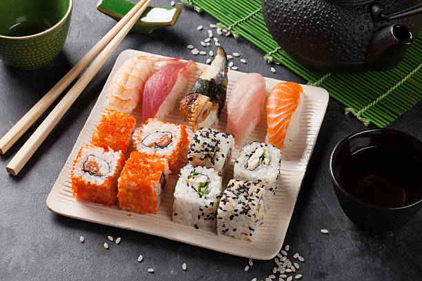 istock Set of sushi, maki and green tea 539473362