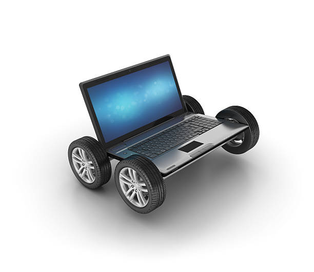 istock Car Wheels with Laptop on White Background 539473806