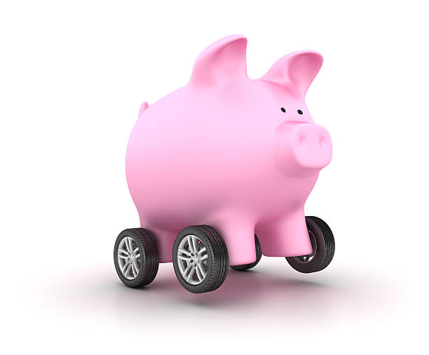 istock Car Wheels with Piggy Bank 539474046
