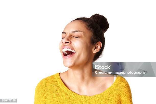 Excited Young African Woman Laughing Stock Photo - Download Image Now - Mouth Open, Portrait, White Background