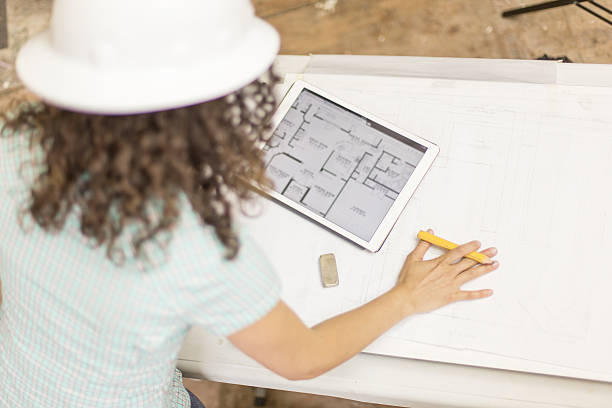 istock Female homeowner working on diy project at home with 539479002