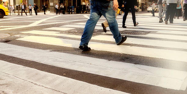 istock People crossing the street, NYC 539479502