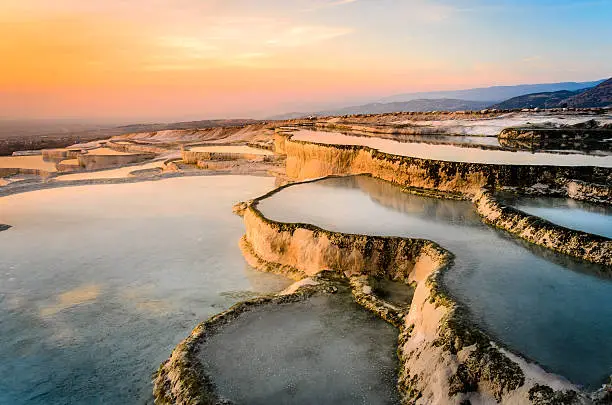 Photo of Carbonate travertines the natural pools during sunset, Pamukkale
