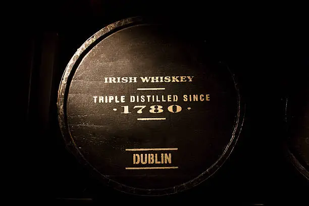 Old wooden barrel full of Dublin's Irish whiskey.