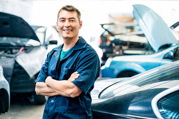 istock Car mechanic in auto repair shop 539483386
