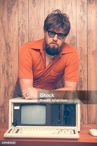 Vintage 1980s Office Worker With Old Computer Stock Photo - Download Image Now - 1980-1989, Old, Senior Adult