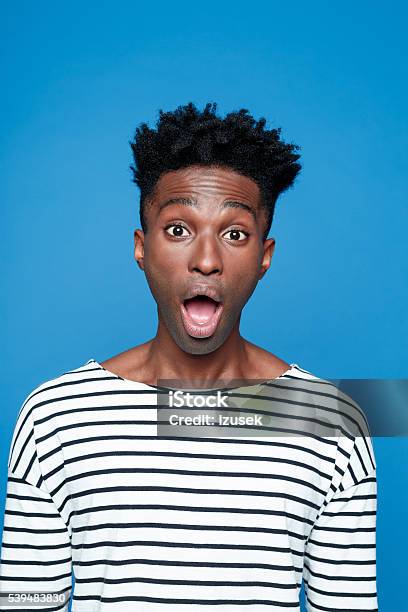 Surprised Afro American Young Man Stock Photo - Download Image Now - Adult, Adults Only, African Ethnicity