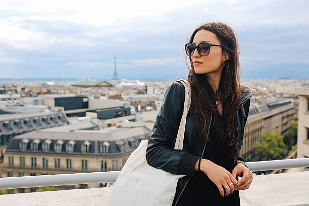 istock Young Parisian woman enjoying the view 539484398