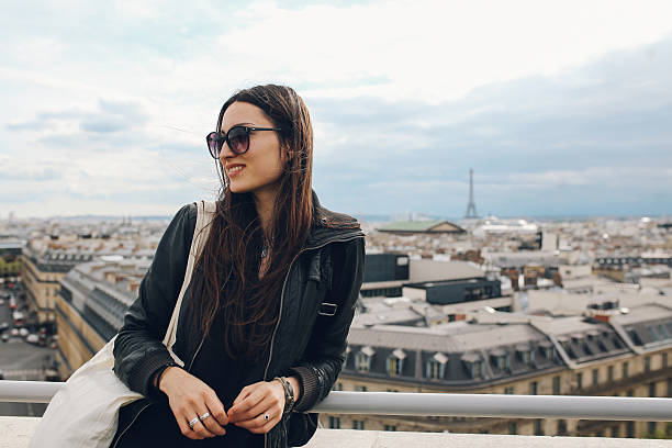 istock Young Parisian woman enjoying the view 539640352