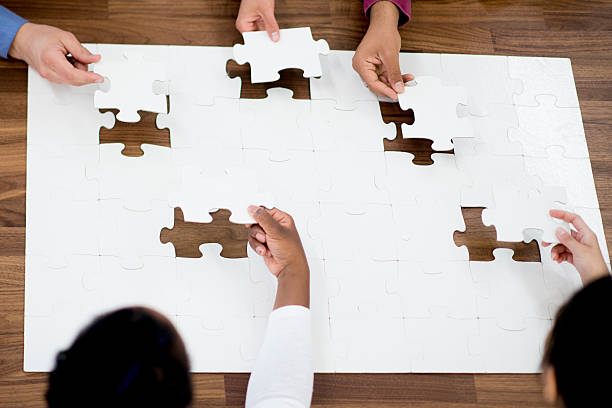 istock Putting Together the Puzzle Pieces 539640950