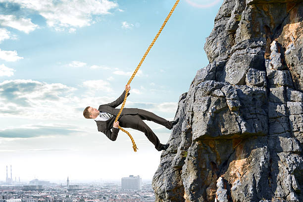 istock Business man climbs mountain 539643390