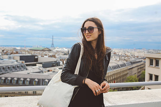 istock Young Parisian woman enjoying the view 539644024
