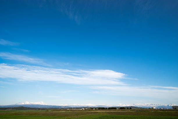 istock daisetuzan mountain range seen from Asahikawa Airport , Blue sky 539644518