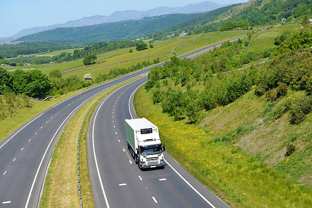 Refrigerated Rigid Goods Vehicle on Open Road stock photo