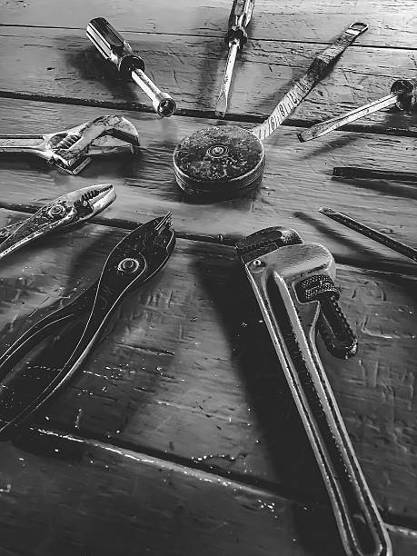 istock old tools on the wood table in black and white 539647218