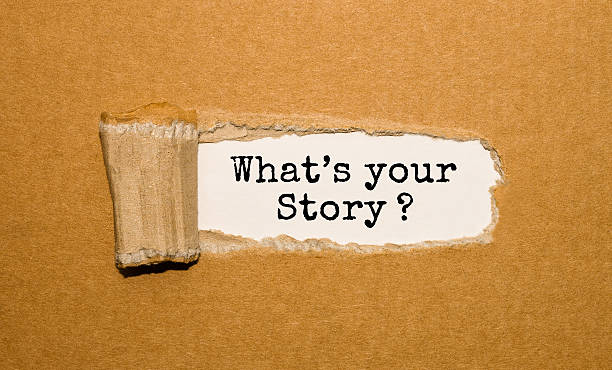 istock The text What's your story? appearing behind torn brown paper 539649480