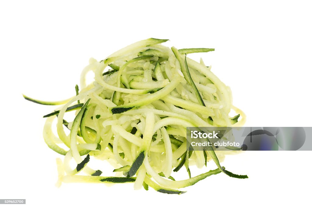 Zucchini spaghetti Grated zucchini spaghetti - studio shot with a white background Zucchini Stock Photo