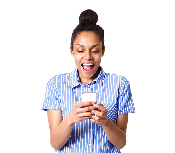 istock Young woman laughing with mobile phone 539655968
