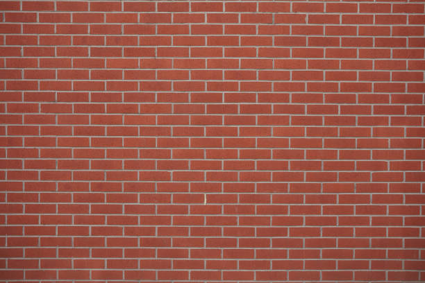 Brick Wall Red brick wall background with copy space. red brick tile stock pictures, royalty-free photos & images