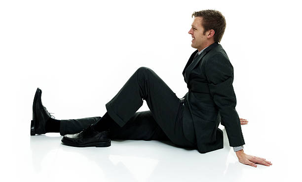 istock Smiling businessman sitting and looking away 539657440