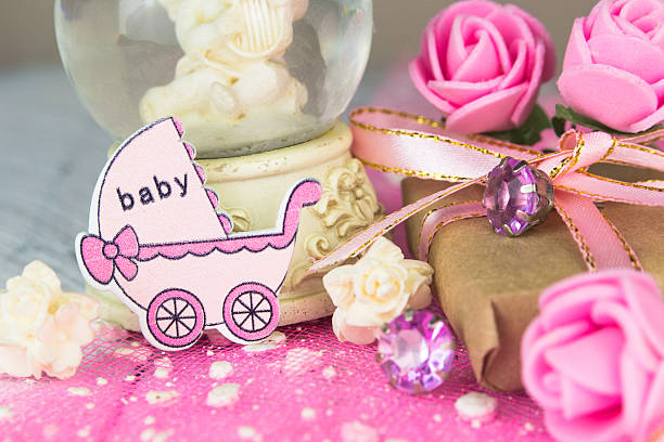 istock Pink wooden carriage figure with wrapped presents. 539657744