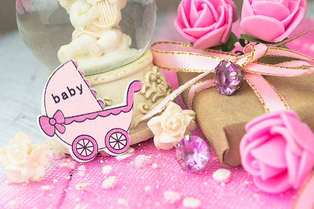 istock Pink wooden carriage figure with wrapped presents. 539657864
