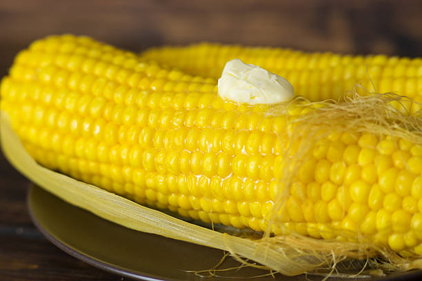 istock Close up of boiled corn with melting butter peace 539657986