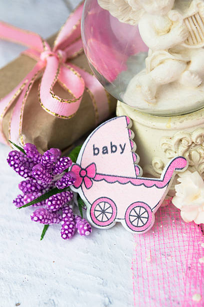 istock Pink wooden carriage figure with wrapped presents 539658098