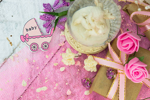 istock Pink wooden carriage figure with wrapped presents 539658228