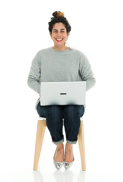 istock Cheerful woman working on laptop 539658612