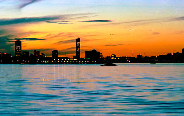 istock Luminous sunset over south Boston Harbor with the skyline and 539658894