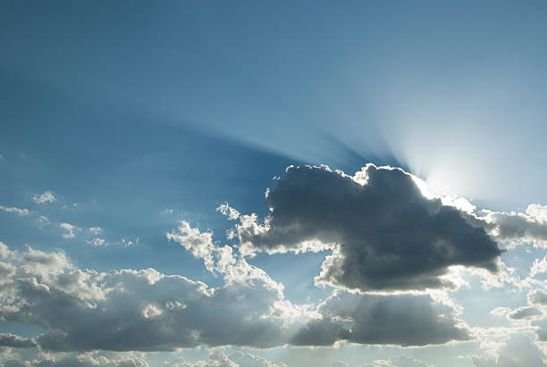 The Sun makes a silver lining stock photo