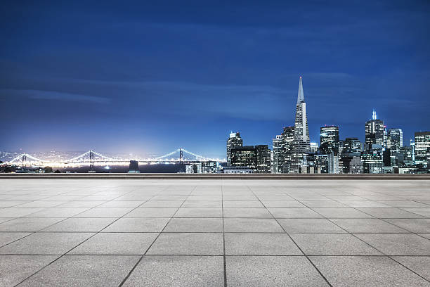 istock empty pavement with cityscape and skyline of san francisco 539668422