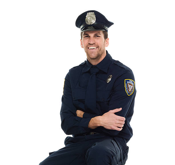 istock Cheerful police sitting and looking at camera 539668930