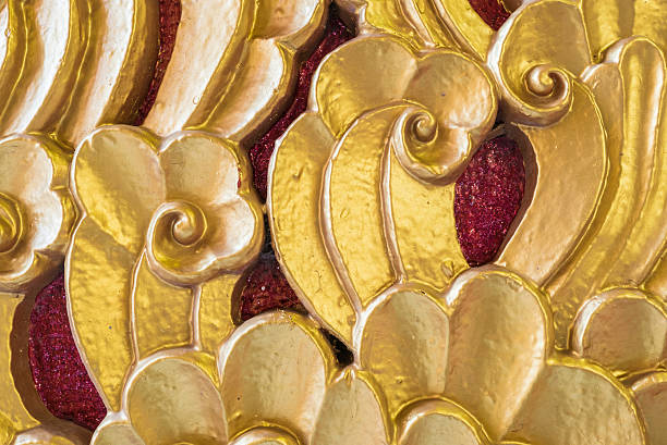istock Closeup yellow painted wood pattern at temple door texture background 539669996