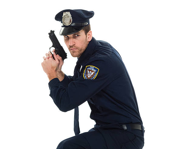 istock Police in action with gun 539671140
