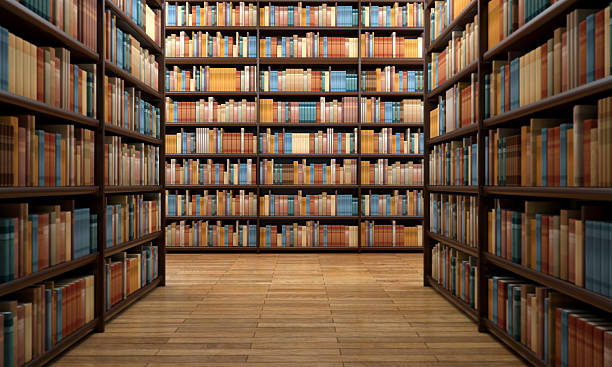 Library aisle with wooden shelves and hundreds of books View of a library aisle surrounded by wooden shelves full of books with modern, classic and vintage covers. Hundreds of books create a background for cultural and educational topics. Book spines are blank with neither title nor text. Wooden parquet floor. Warm brown and beige hues. Digital generated image with soft focus on image sides. bookshelf library book bookstore stock pictures, royalty-free photos & images