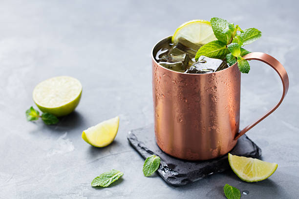 istock Cold Moscow Mules cocktail with ginger beer, vodka, lime 539676912