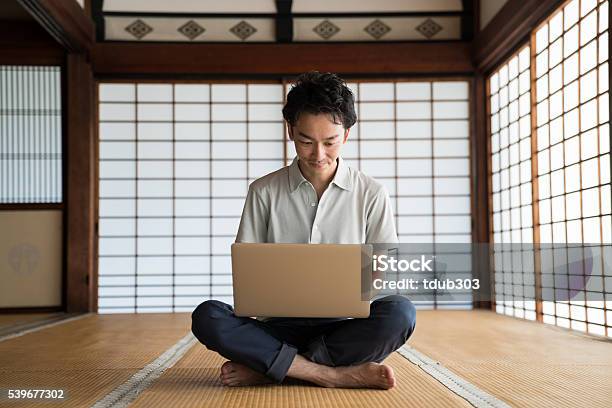 Japanese Using Computer Man Using A Laptop Computer In A Japanese Temple Stock Photo - Download ...