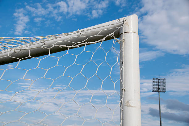 istock Close up Top triangle goal football and net 539679596