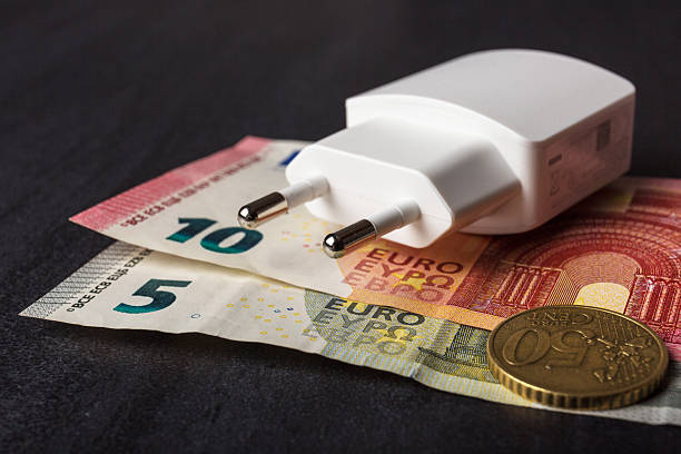 istock Power cord and euro banknotes. Expensive energy concept. 539680694