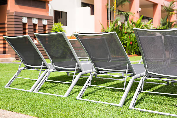 istock Beach chairs near swimming pool 539682824