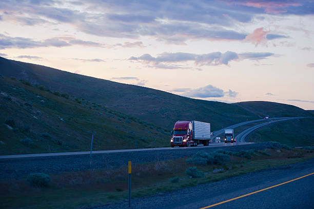 istock Evening road with semi trucks going uphill in Columbia Gorge 539682916