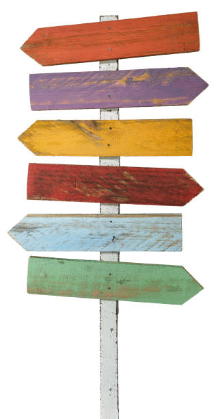 Old weathered wood sign arrow shaped boards.