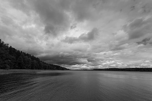Dramatic Stormy Sky Over Lake Stock Photo - Download Image Now - Black And  White, Cloud - Sky, Gray Color - iStock