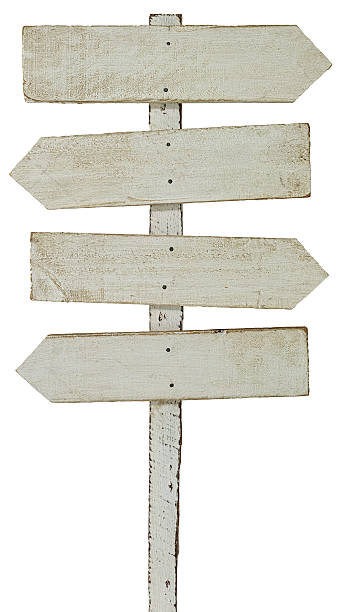 istock Old weathered wood sign arrow shaped boards. 539683586