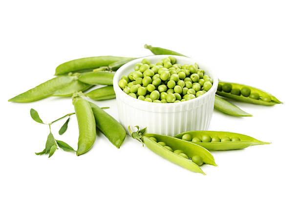 istock Green peas isolated on a white 539685050